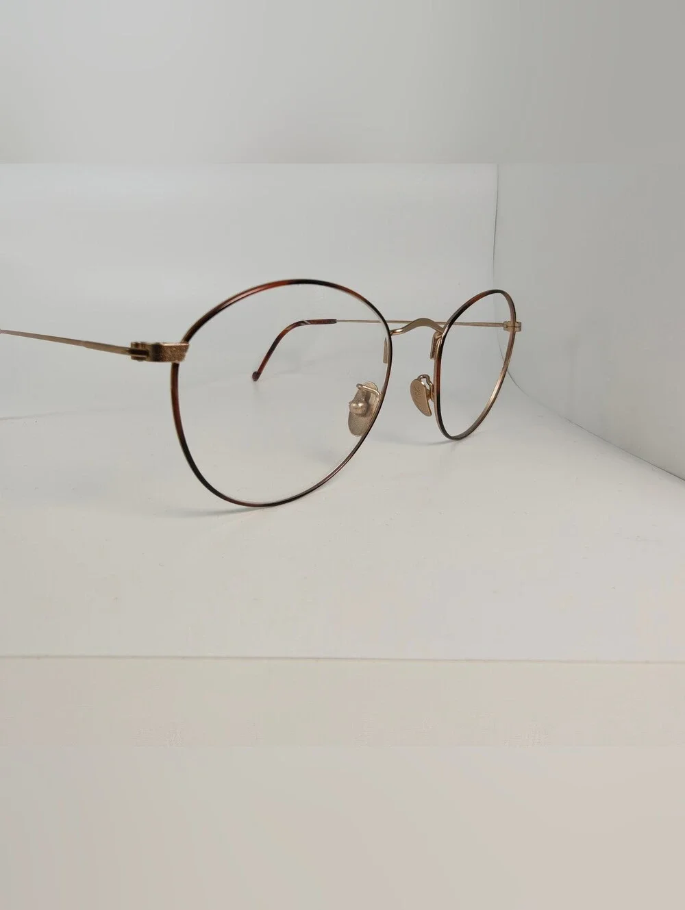Village 16. 51-19. Lightweight Round Metal Frame Glasses in Gold with Brown Rim